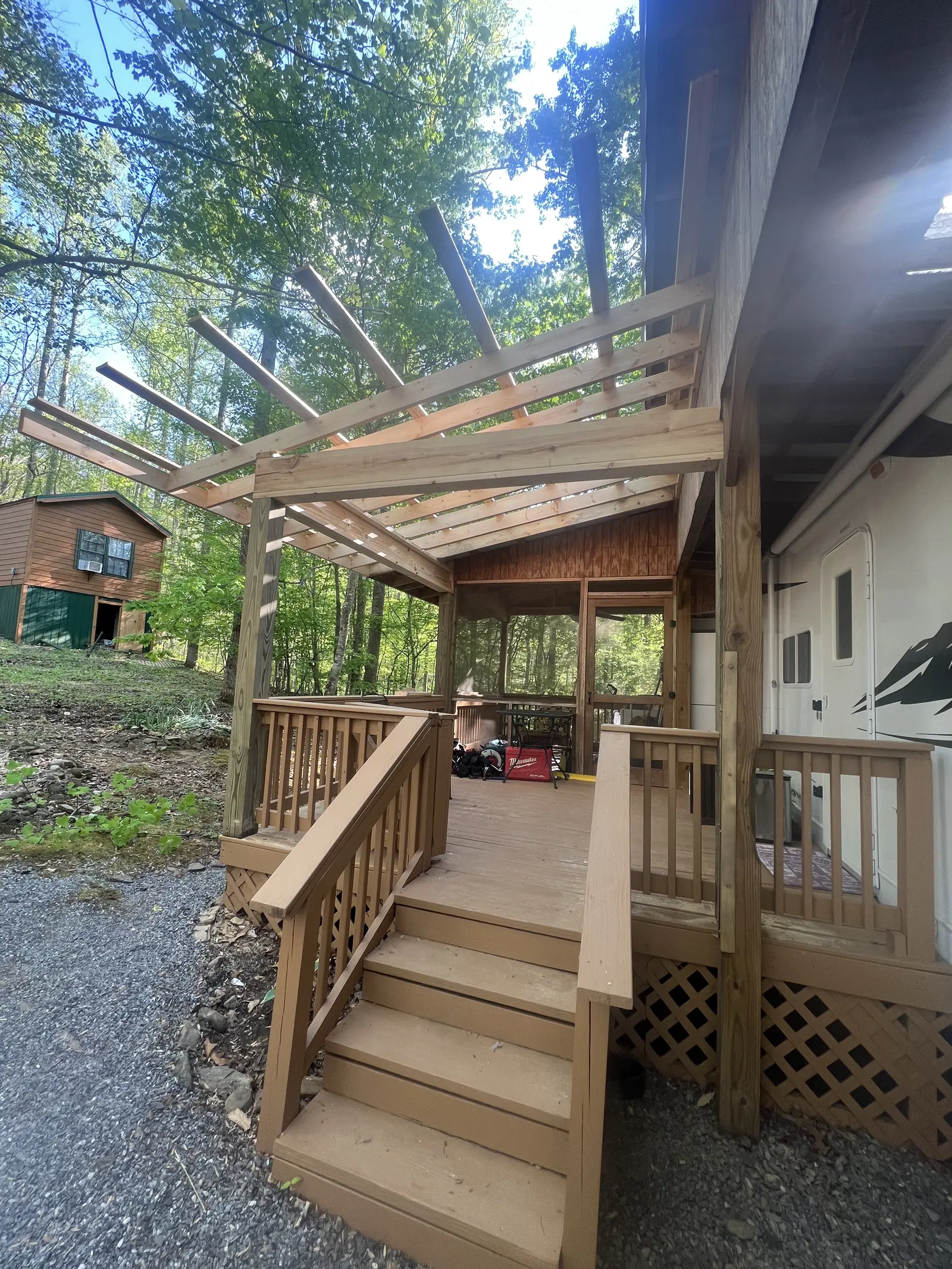 Porch half-finished during staining